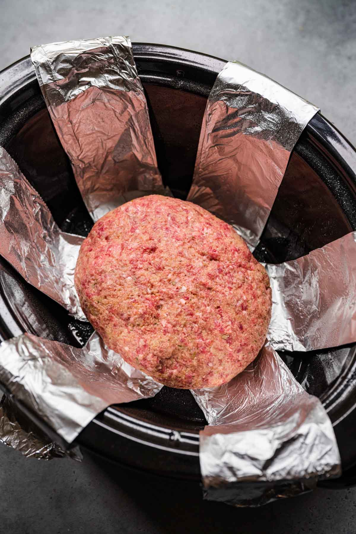 Slow Cooker Meatloaf in slow cooker insert before cooking