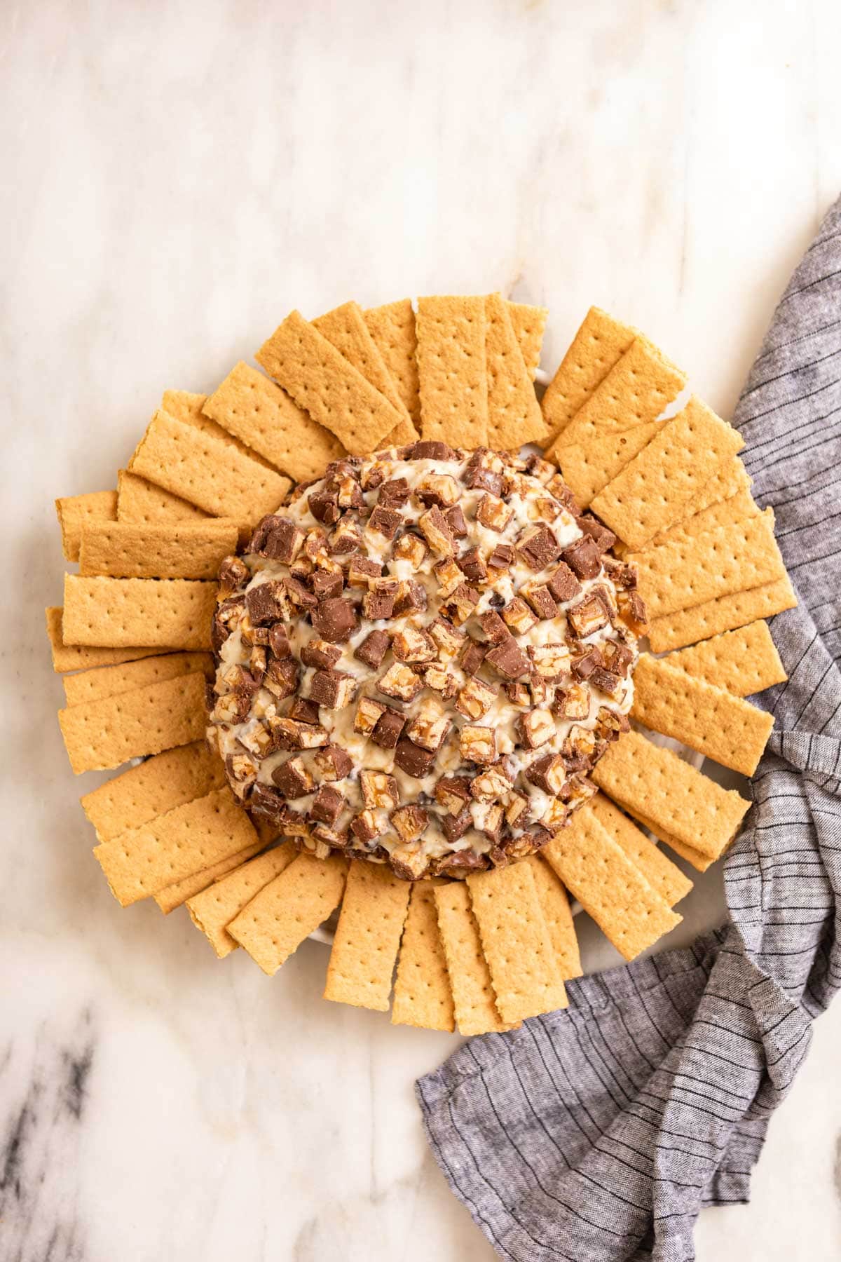 Snickers Cheeseball in serving bowl