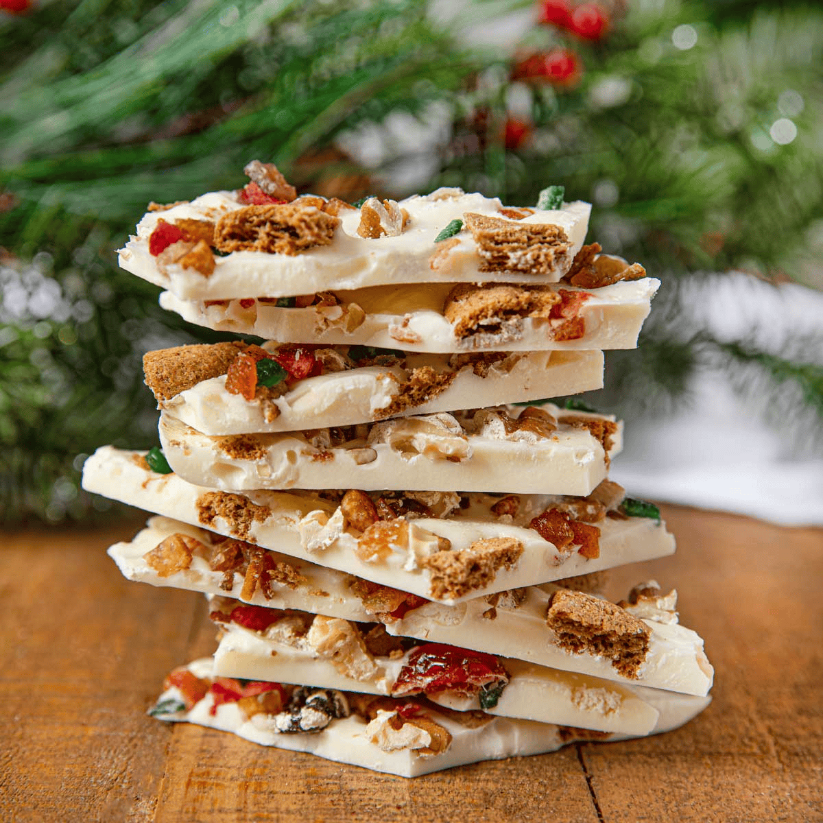 Stack of candy bark in front of foliage