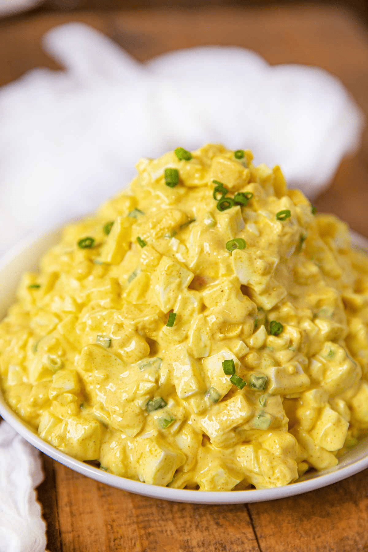 Egg salad topped with fresh green onions