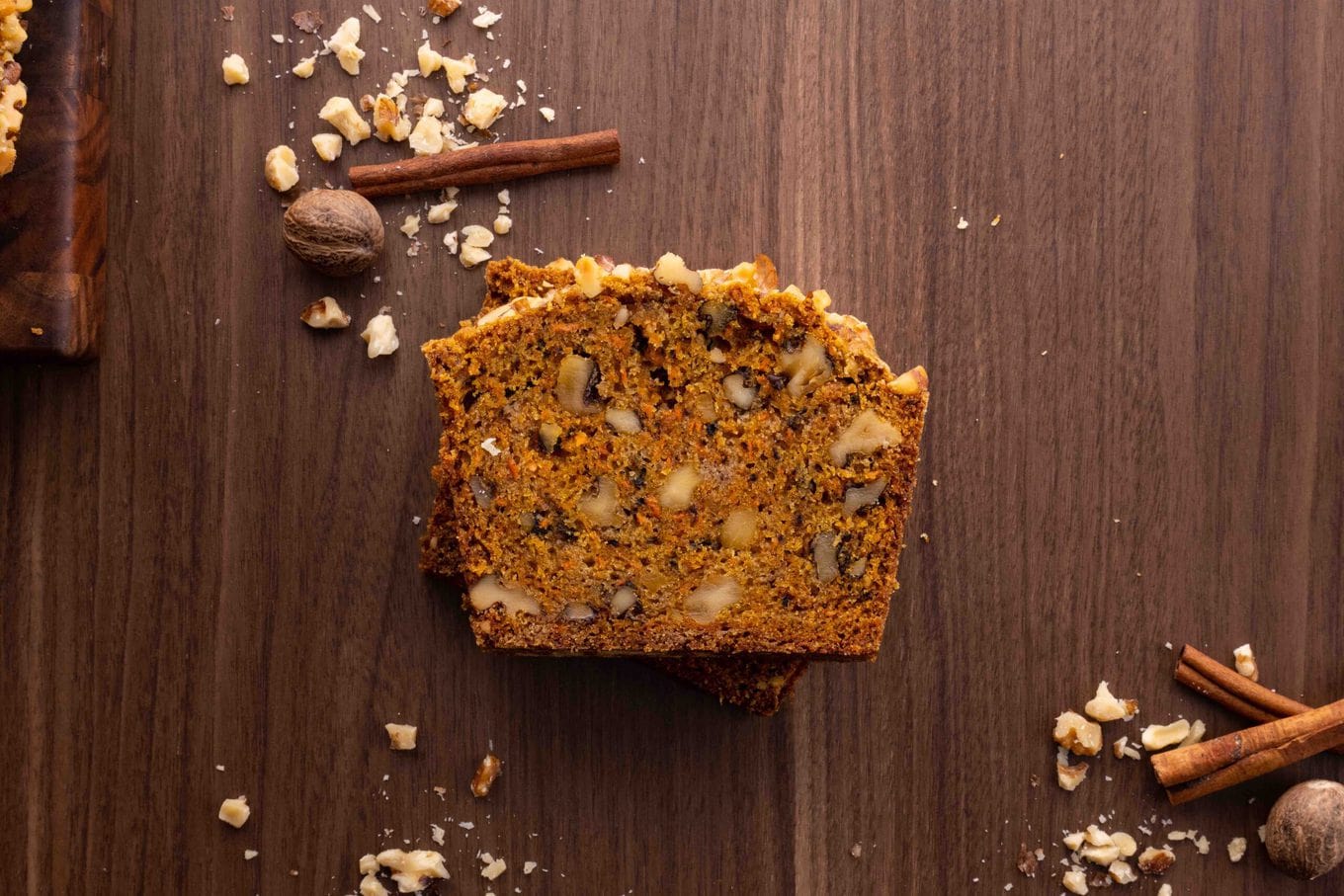 Carrot Bread slice on board with nuts