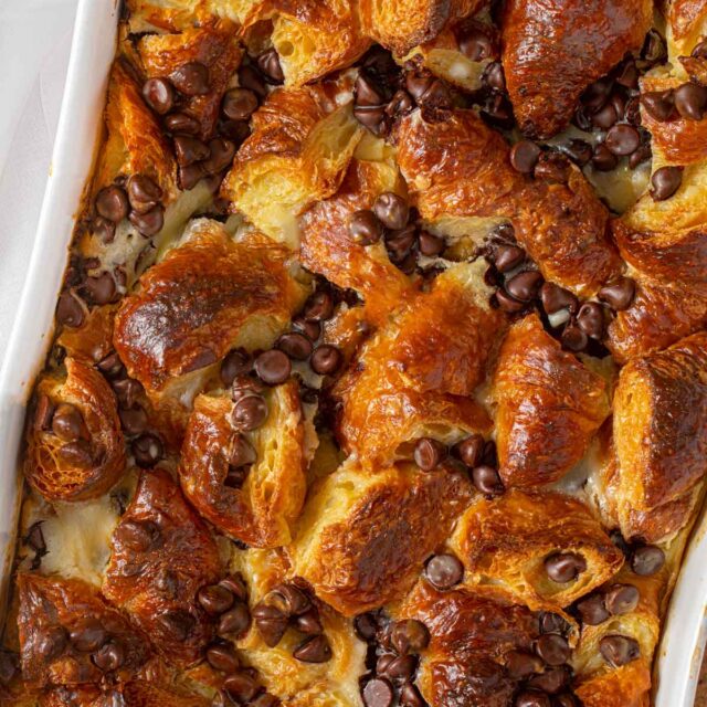 Chocolate Croissant Casserole Bake in white baking dish shot from top down