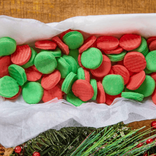 Candies in box with parchment paper