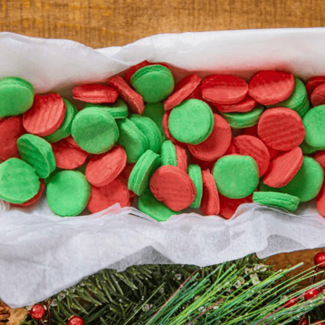 Candies in box with parchment paper