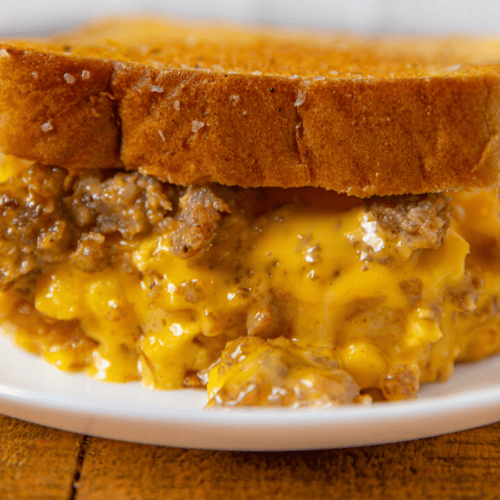 Closeup of a served sandwich on a white plate