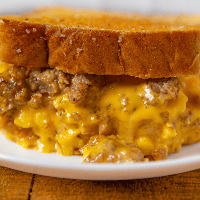 Closeup of a served sandwich on a white plate