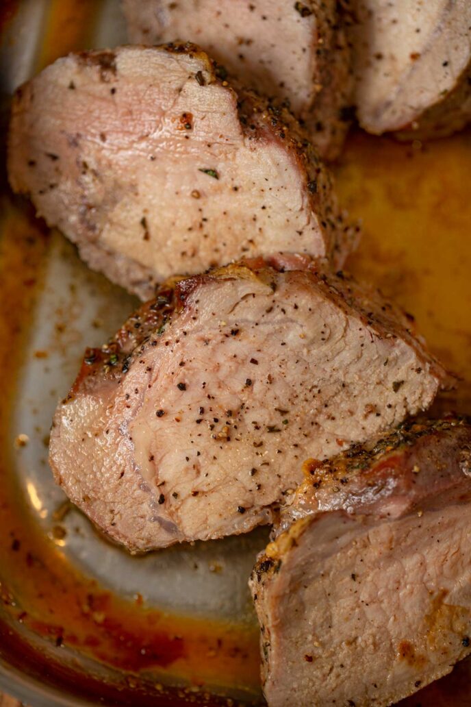 Slice of Boneless Pork Loin Roast with Herb Butter