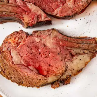 Slice of prime rib on a white plate