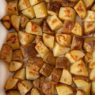 Crispy Roasted Potatoes with Salt and Vinegar Flavoring in baking dish