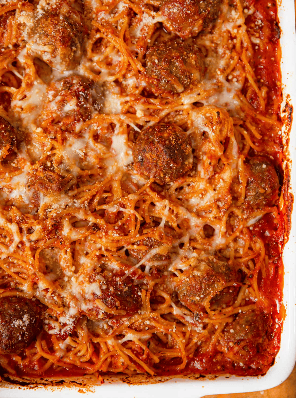 Spaghetti with cheese and meatball topping