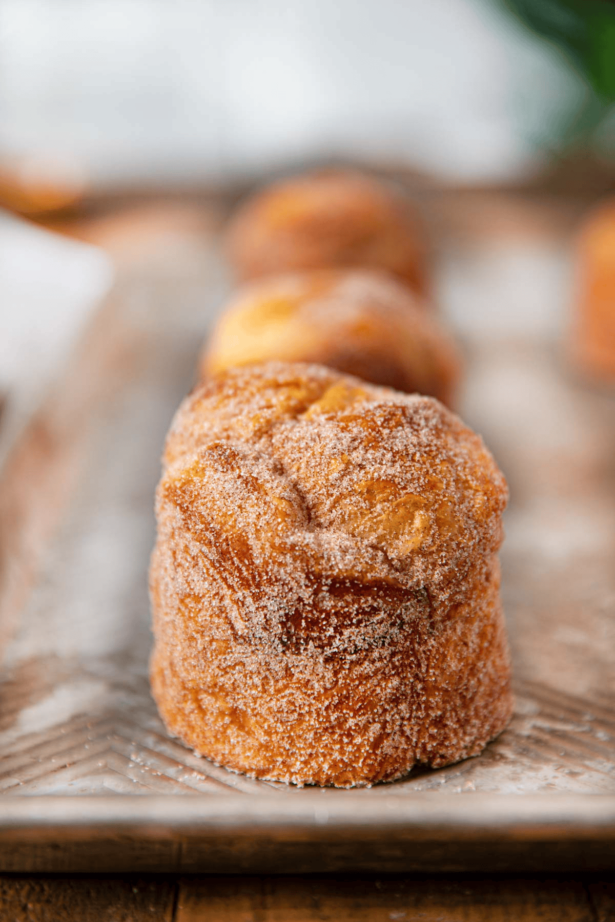 Cinnamon sugar coated pastry on a baking sheet