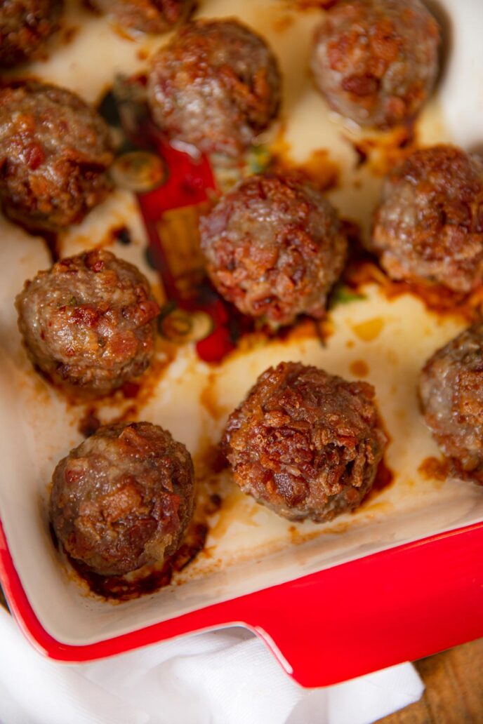 Bacon Meatballs lined up on baking dish