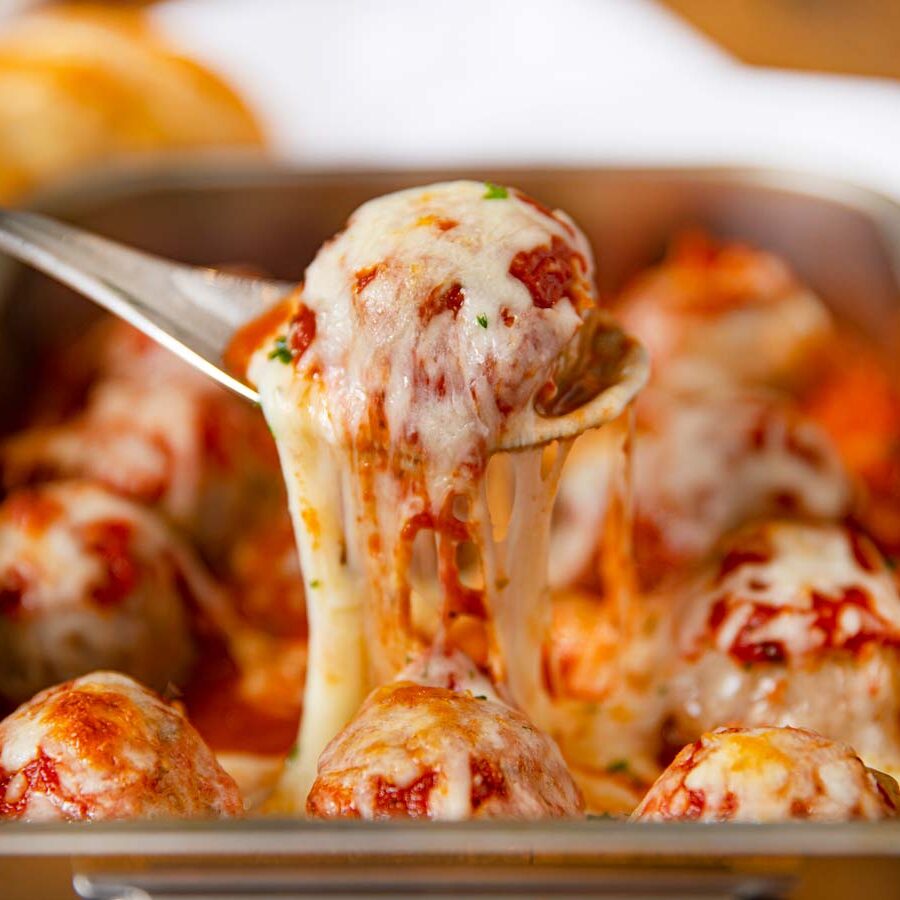 Cheesy Meatball Casserole scoop with spoon