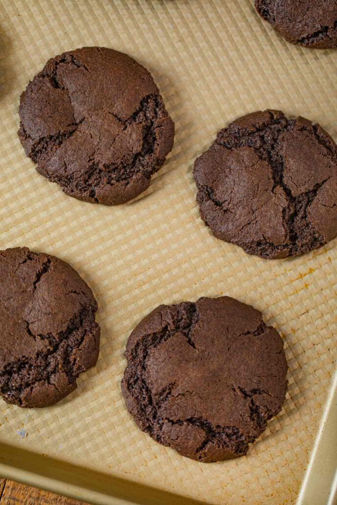 Chocolate Cookies on golden baking sheet