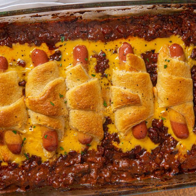 Casserole with chili dogs in baking dish