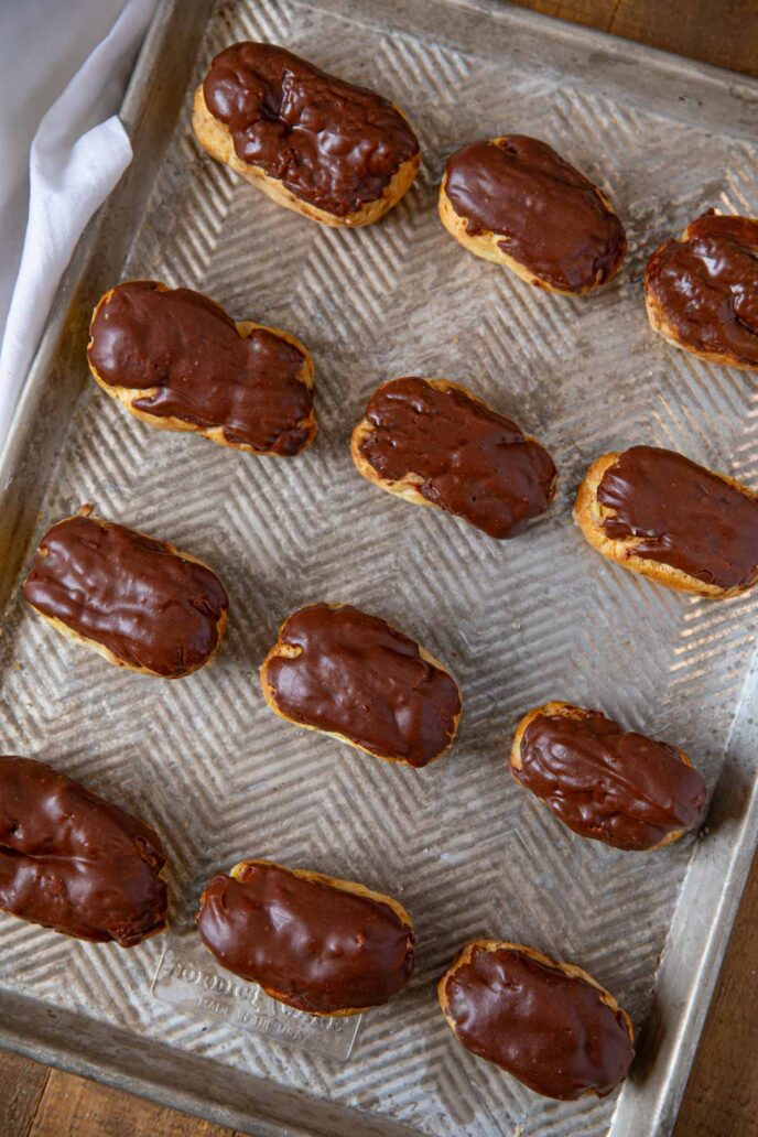 Chocolate Eclairs on baking tray