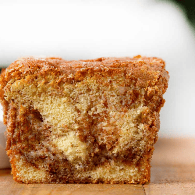 Closeup of dessert cut in half showing the swirl inside