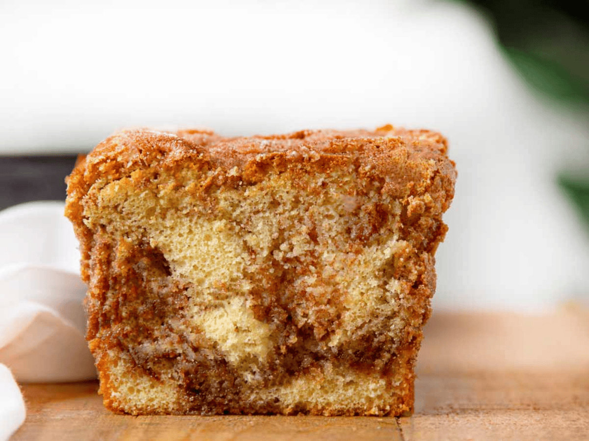 Closeup of dessert cut in half showing the swirl inside