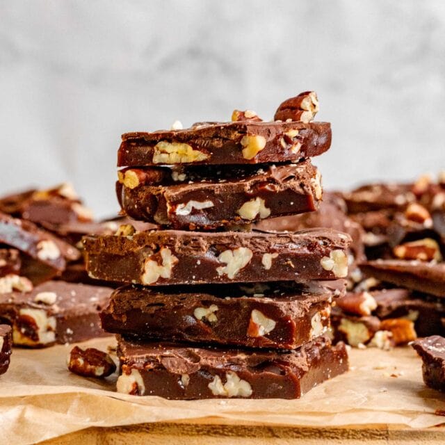Gingerbread Toffee pieces stacked on a cutting board