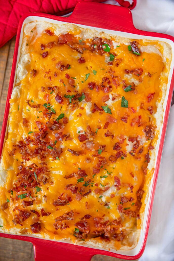 Tray of Meatloaf Casserole with Loaded Mashed Potatoes with Cheese and Bacon on top
