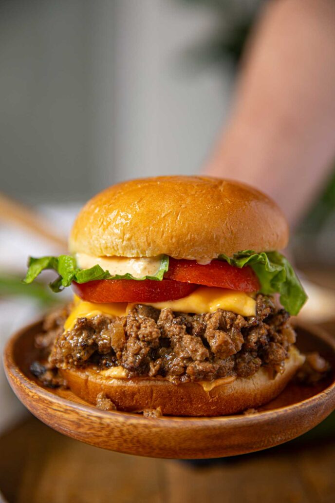 Shake Shack Sloppy Joes sandwich held up on plate