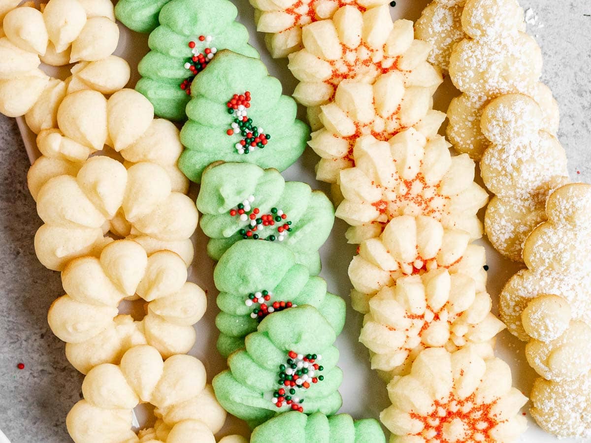 https://dinnerthendessert.com/wp-content/uploads/2020/01/Spritz-Cookies-4-3-1.jpg