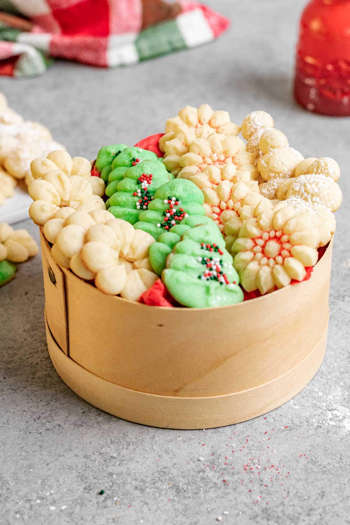 Spritz Cookies with holiday sprinkles in gift box