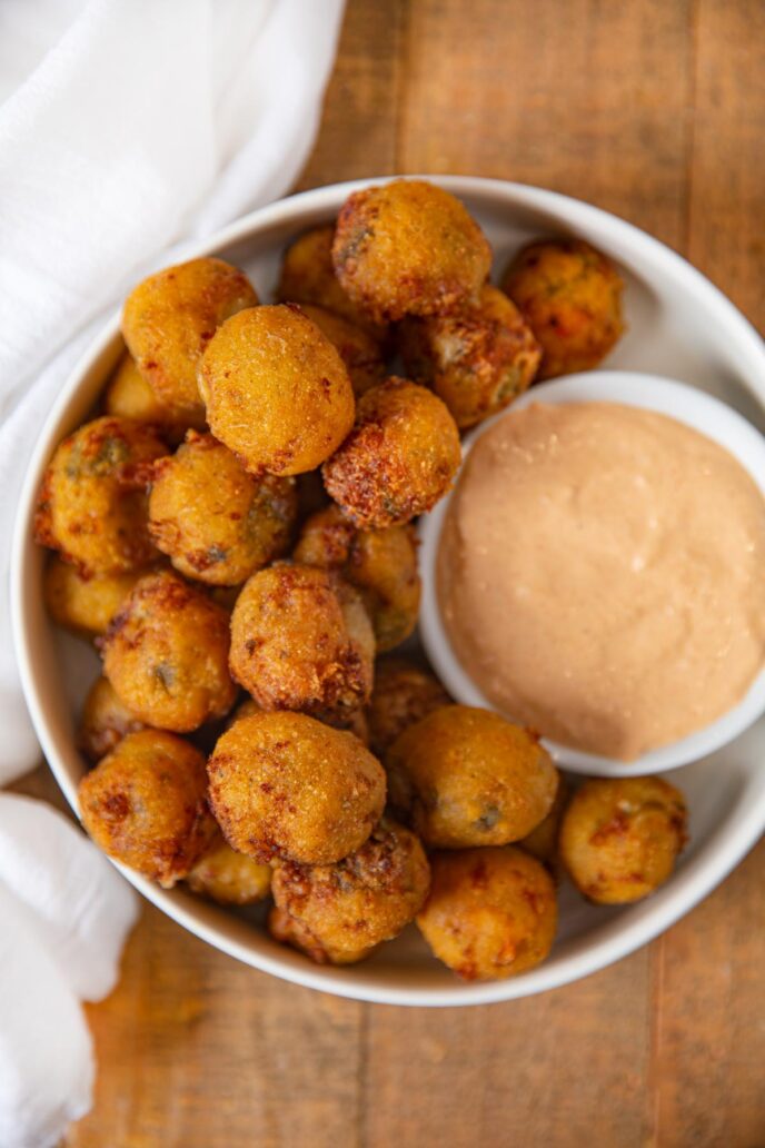 Texas Roadhouse Rattlesnake Bites on plate with spicy horseradish