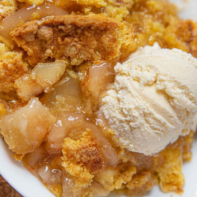 Crumble with Vanilla Ice Cream in a white dish