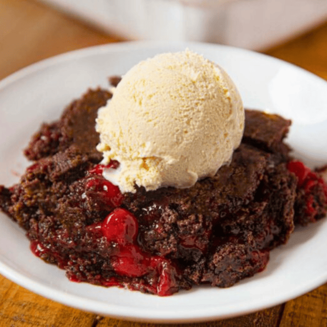 Chocolate Cake with cherries and ice cream