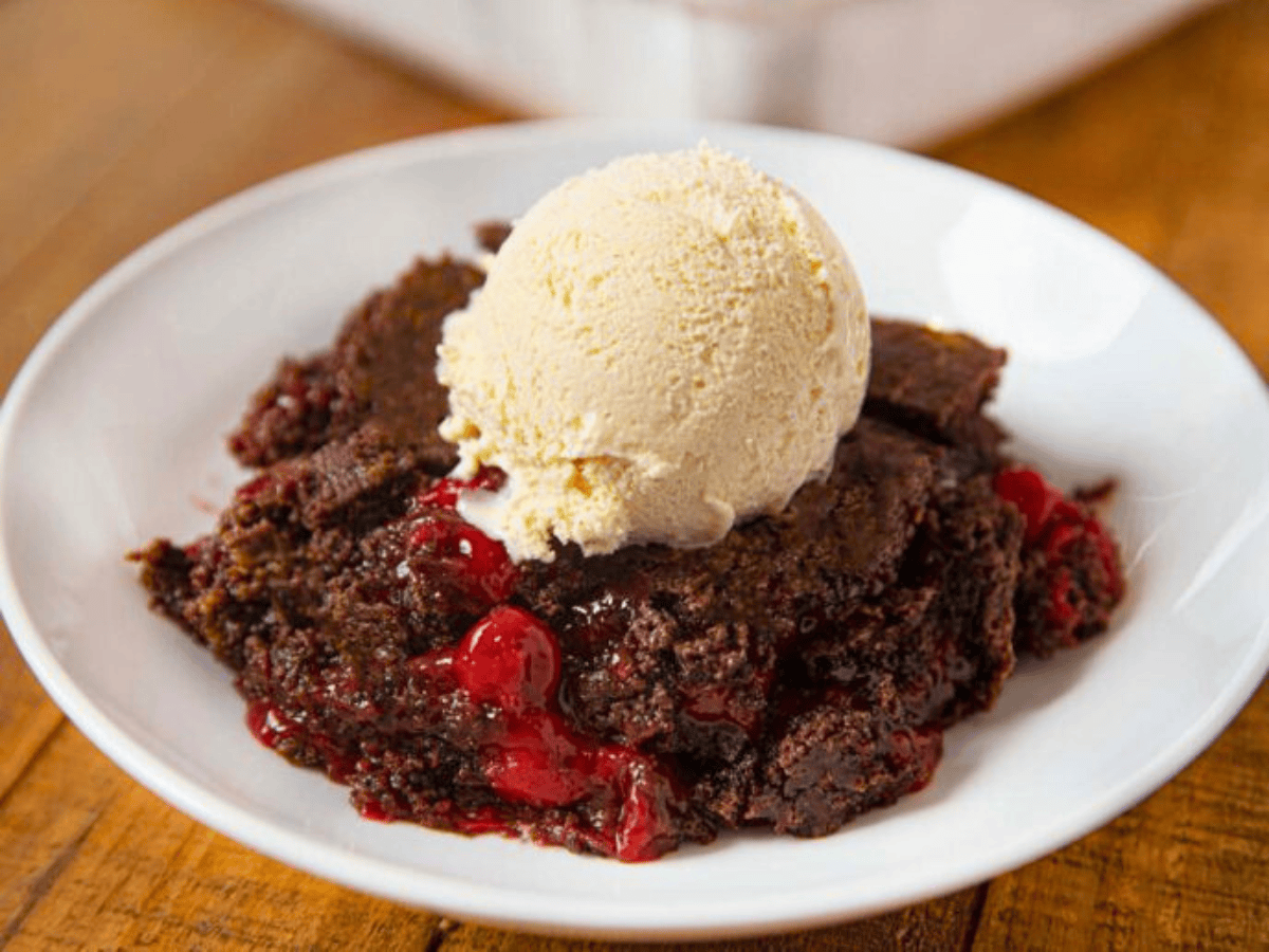 Chocolate Cake with cherries and ice cream