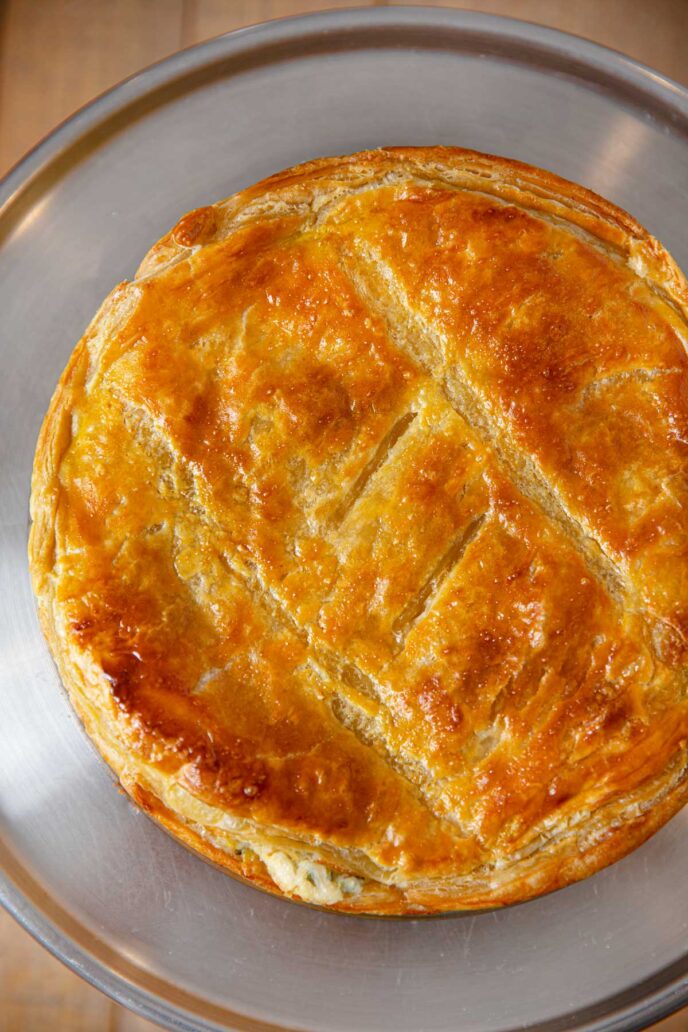 Spinach and Chicken Pie top-down on cake stand