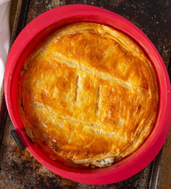 chicken pie in red bowl