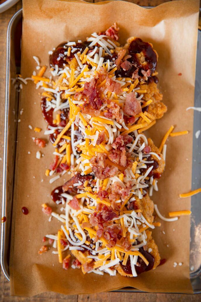 Domino's Sweet BBQ Bacon Chicken covered with cheese before cooking