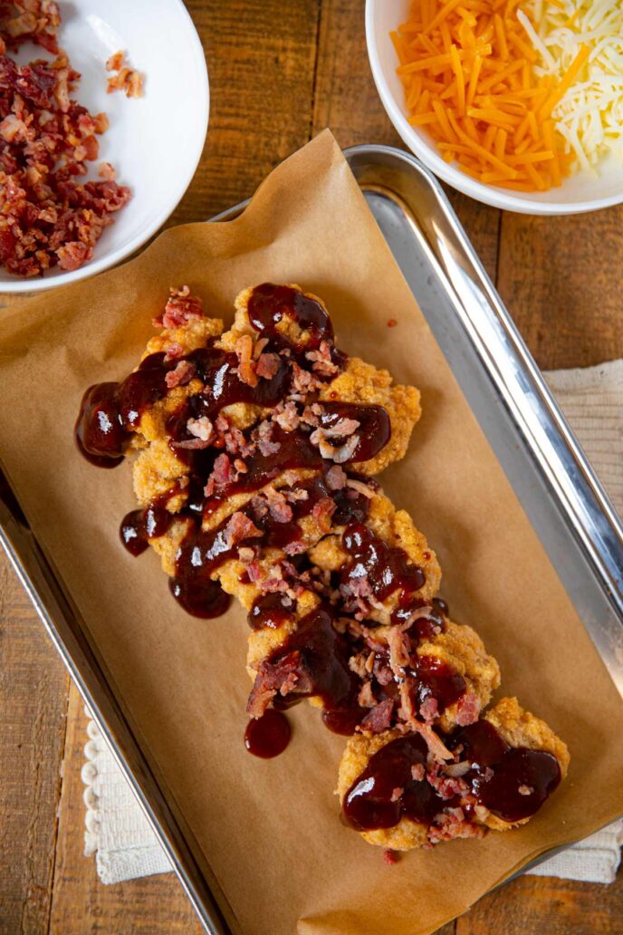 Domino's Sweet BBQ Bacon Chicken covered in barbecue sauce and bacon