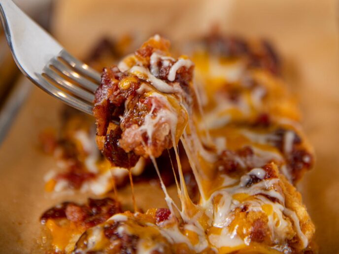 Domino's Sweet BBQ Bacon Chicken bite on fork