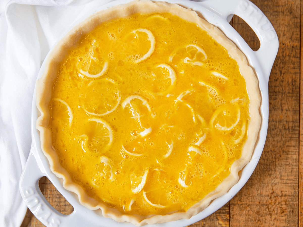 Unbaked ingredients in a pie baking dish ready for the oven
