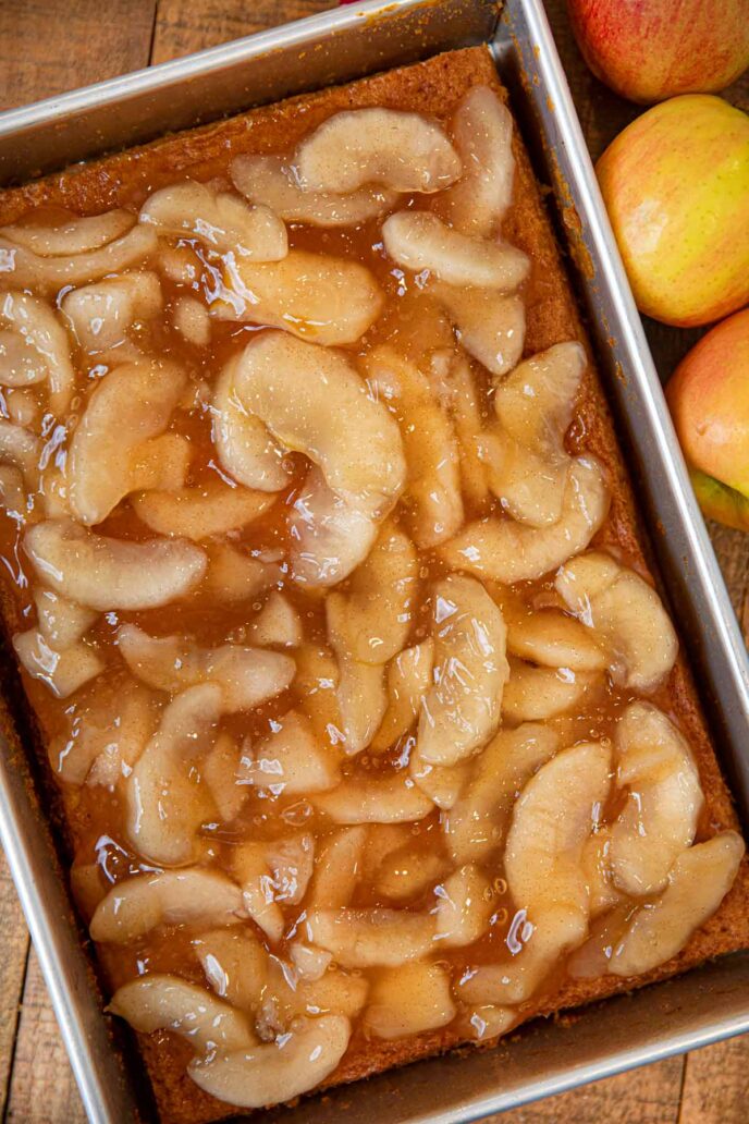 Apple Cake in silver baking pan with apple pie filling on top