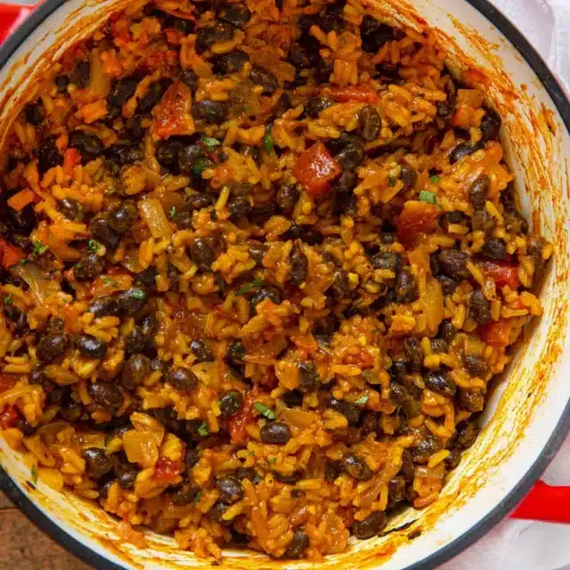 Cooked ingredients in a red pot ready to serve