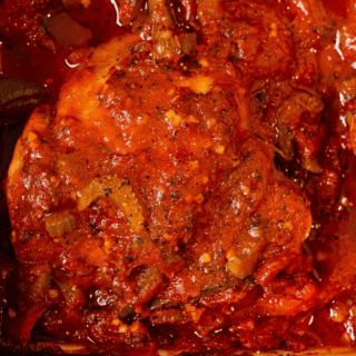 top-down view of cacciatore chicken in baking dish