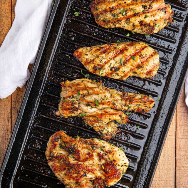 Four pieces of Cilantro Lime Chicken on grill pan