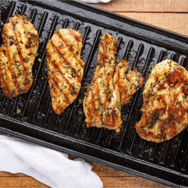 4 pieces of chicken on the grill