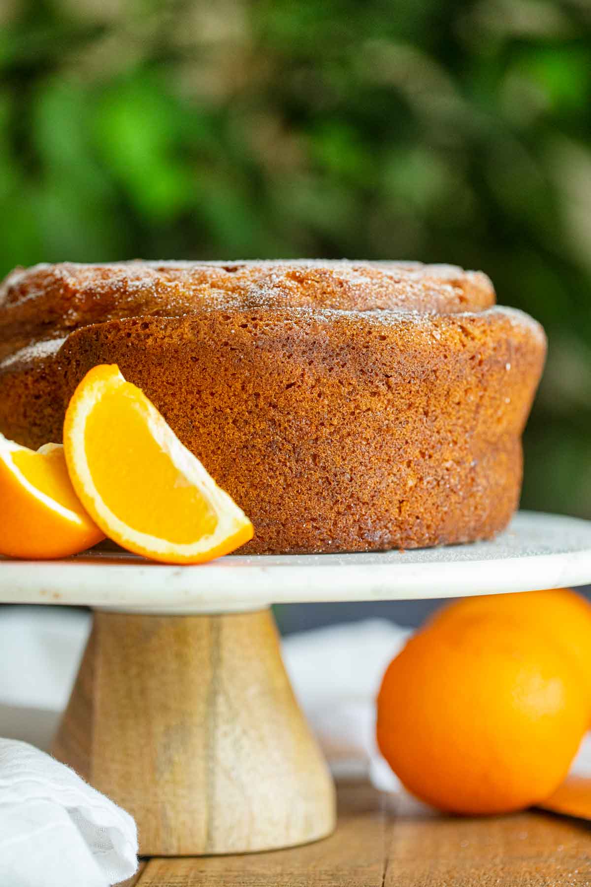 Orange Bundt Cake on cake stand, unsliced