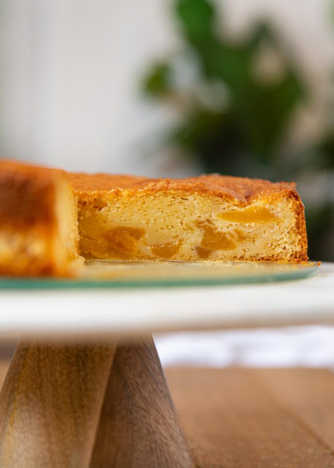 Peach Cake sliced open on cake stand