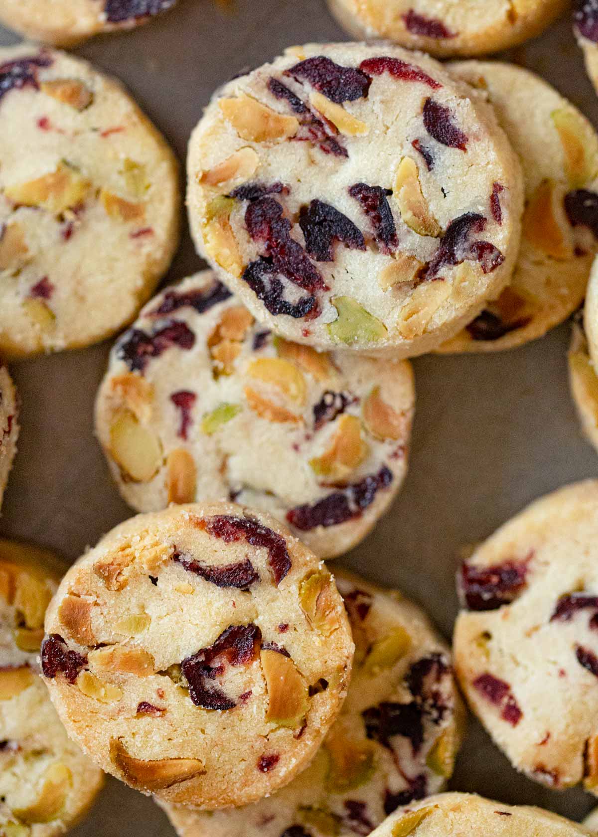 Pistachio Cranberry Shortbread Cookies on cookie sheet