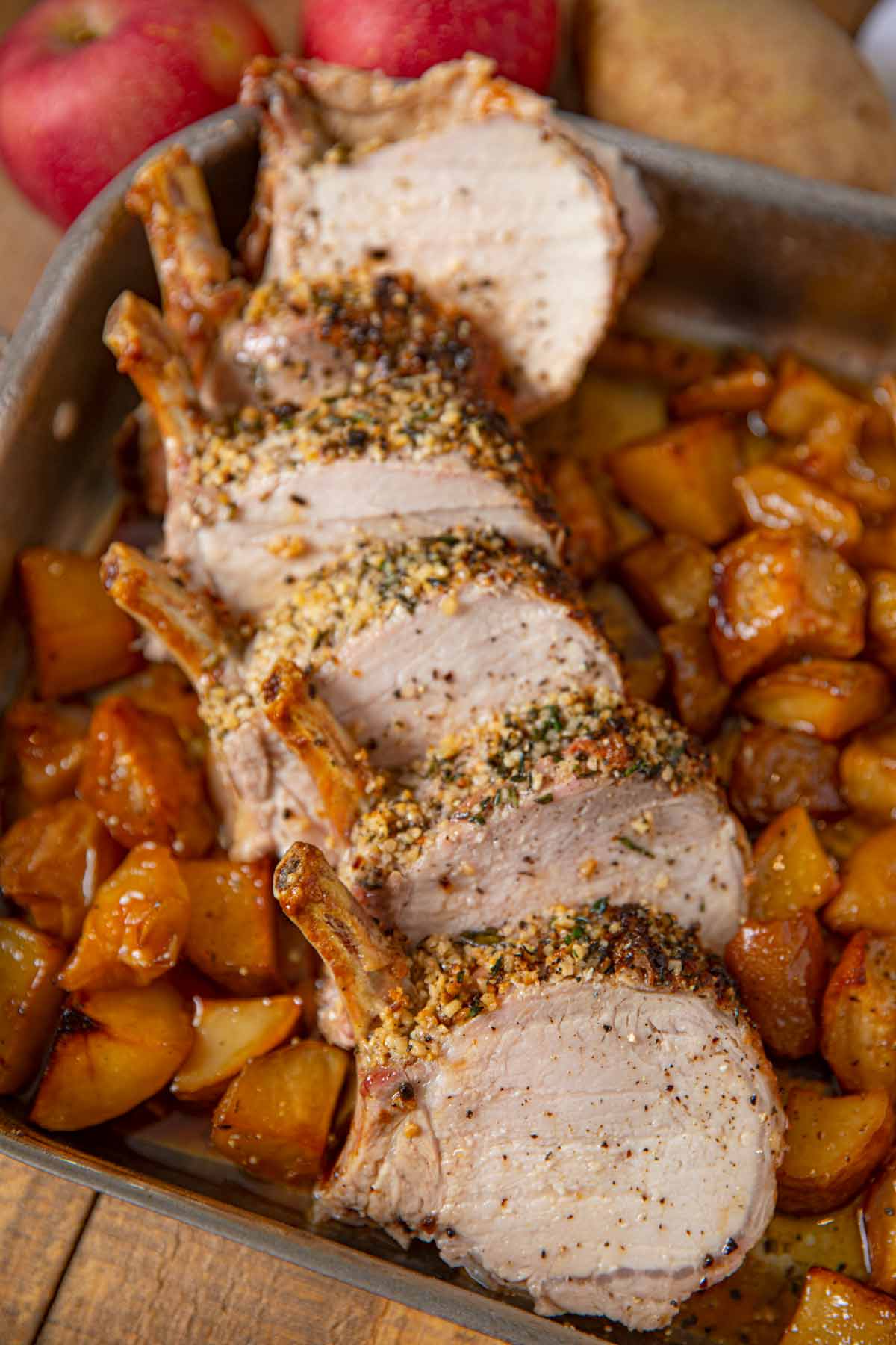 Roasted Rack of Pork individual chops on a bed of roasted potatoes