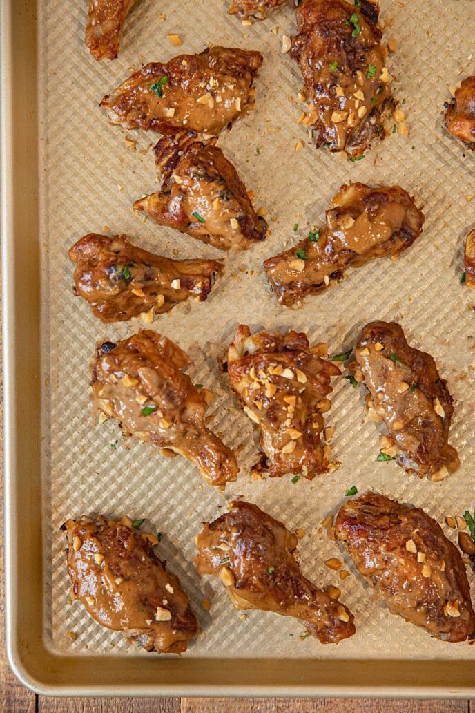 Thai Peanut Chicken Wings on baking sheet