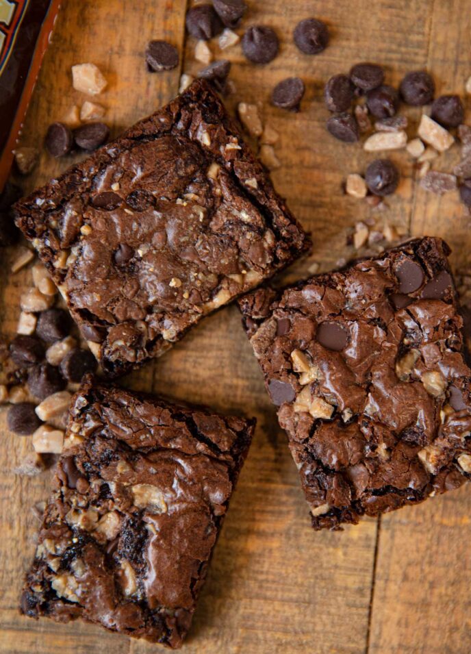 Toffee Chip Brownies on wooden board