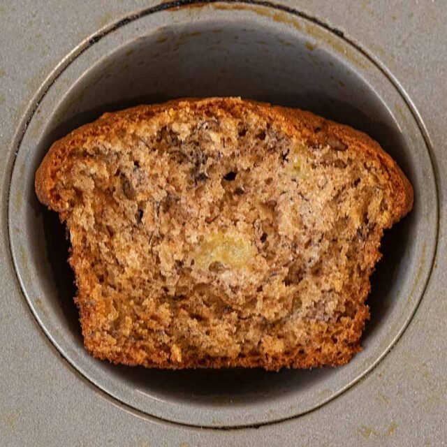 baked treat split in half inside of a baking tin
