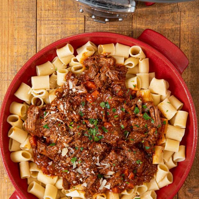 Slow Cooker Beef Ragu in Red Bowl